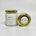 DazzleDeep Sakura Royale scented candle in premium glass jar with soy coconut wax blend and gold lid.